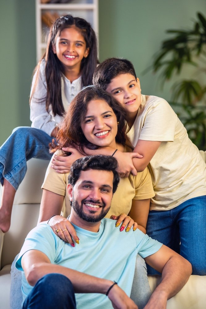Joyful,Indian,Family,Of,Four,Enjoying,Quality,Time,At,Home,
